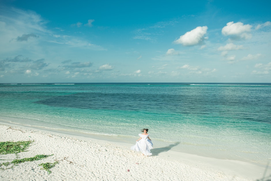 Woman Standing on Seashore